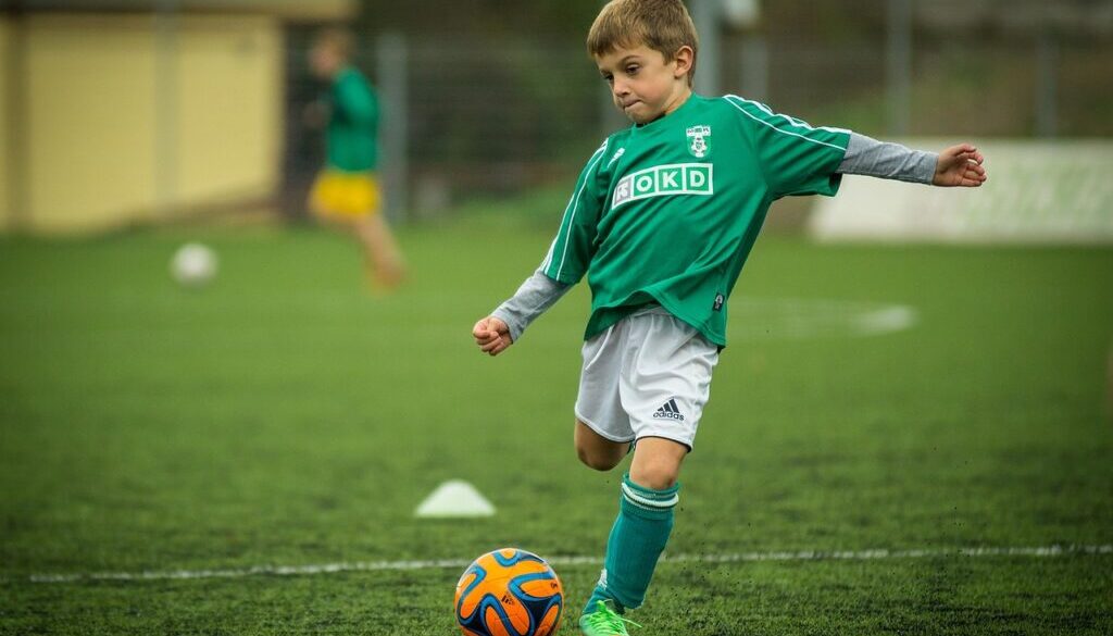 child soccer playing kick 613199